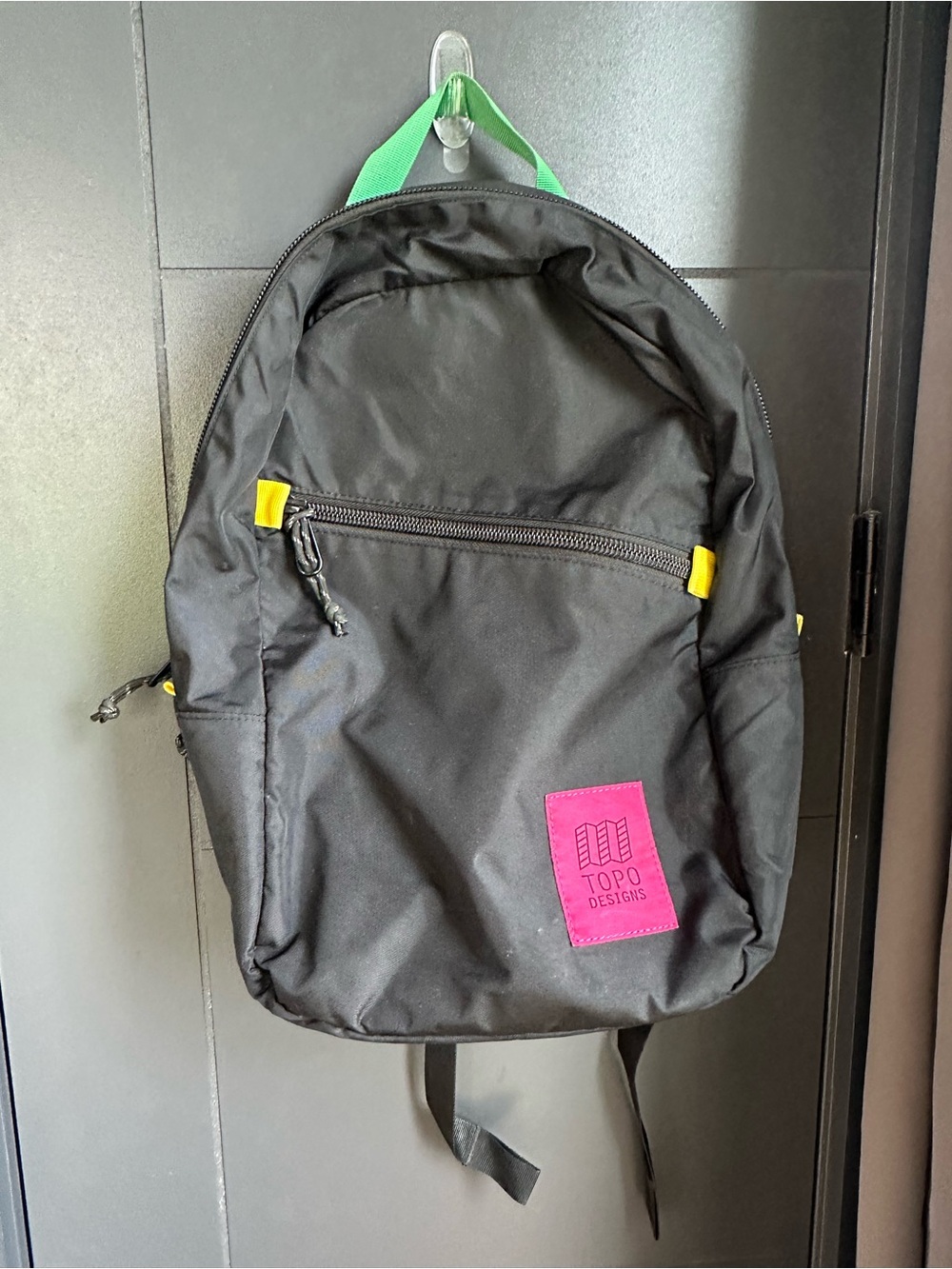 Topo Designs Black Backpack with Pink Logo and Yellow Accents